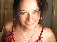 A woman wearing scarlet undergarments