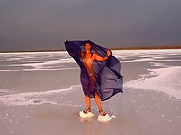 Beautiful sunset scenery by a shawl on a salt lake