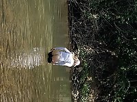 Young mature womans buttocks outdoors