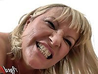 Alisha is vigorously penetrated by a black penis.