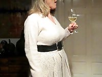 Her petticoat pressed her breasts forward