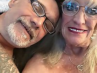 Half-naked explosive mature women posing.