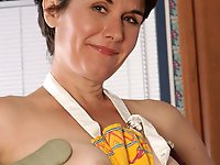 An aged prostitute is spreading her legs to make some money